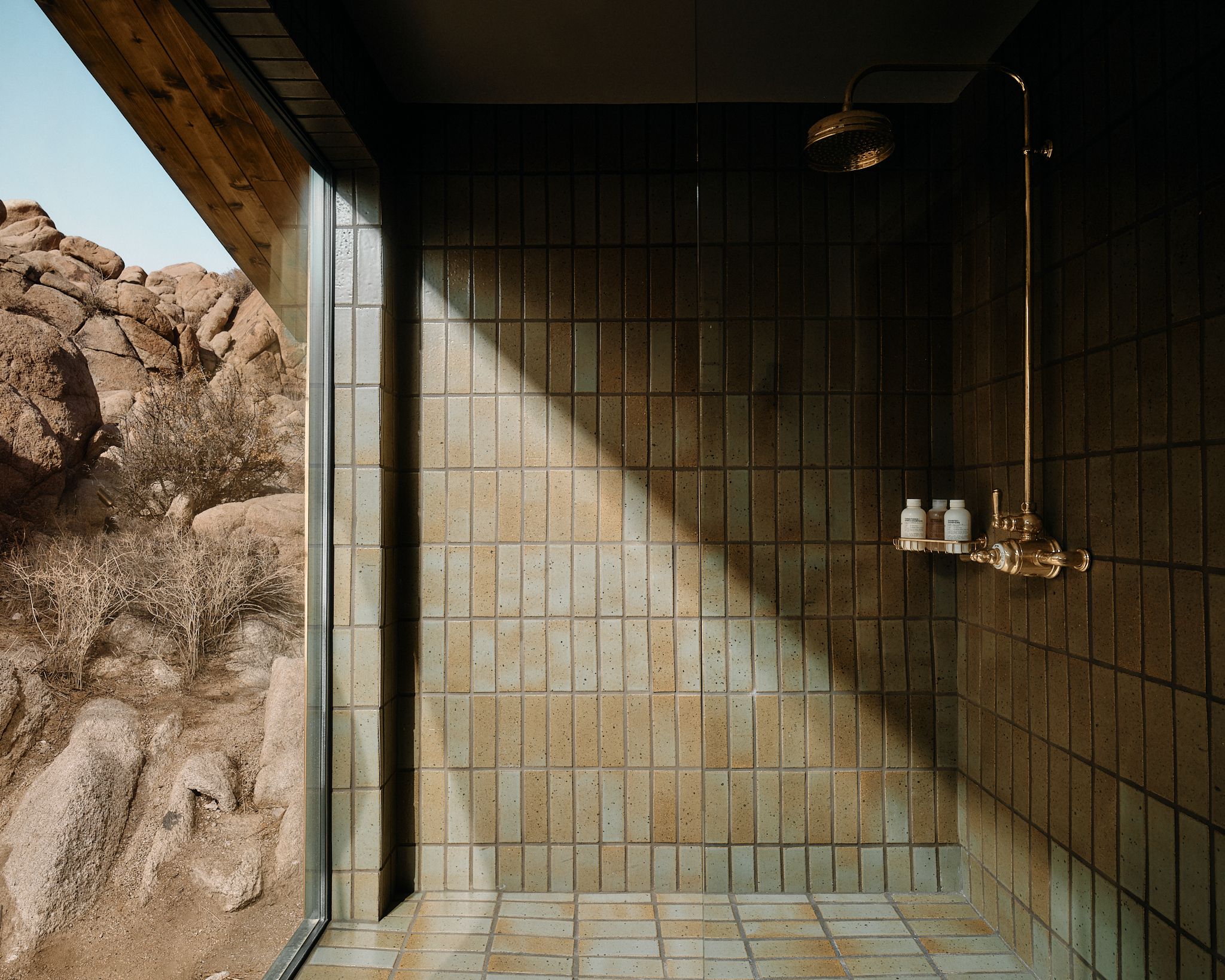 The shower, boulders beyond